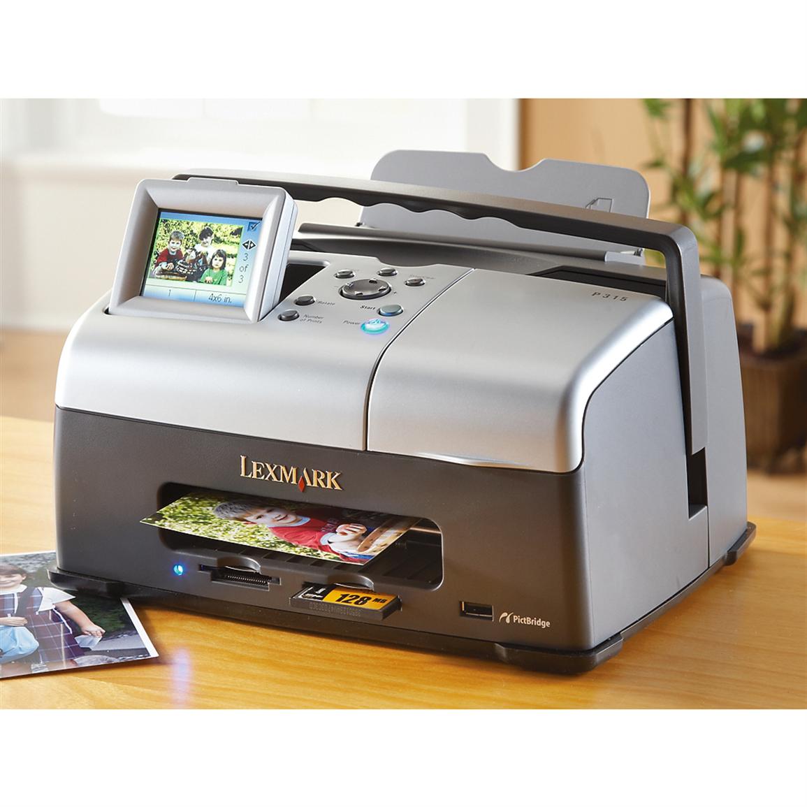 an-epson-printer-sitting-on-top-of-a-table-next-to-a-photo-print-machine