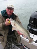 Scott Richardson holding Detroit River walleye.