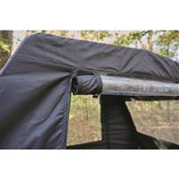 Zippered doors roll up and are secured with snap strap