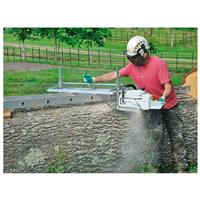 Easily and consistently cut raw lumber into planks using your chainsaw