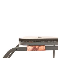 Pads on frame eliminate noise from metal-on-metal contact