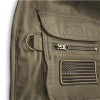 Chest pockets with hook-and-loop closure and zippered piggy back pocket