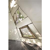Windows with shades and screen-protected air vents