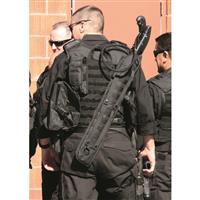 Mounts to your ruck or slings across your back