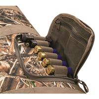 Two side pockets include choke tube/shell holders and a zip pocket