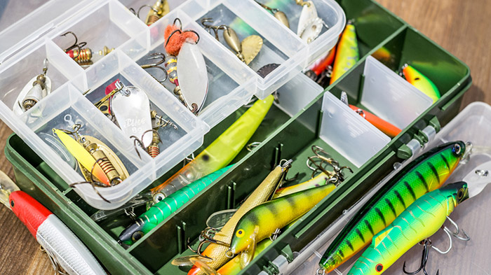 Setting up your tackle box for fishing in a small boat by Master